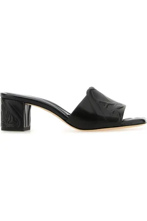 Alexander McQueen Black leather Seal mules