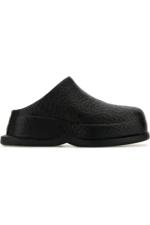 Alexander McQueen Black leather Wave slippers